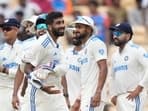 India's Jasprit Bumrah, centre, celebrates with teammates during the first Test against Bangladesh.