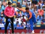 India's Kuldeep Yadav bowls during the ICC men's Twenty20 World Cup 2024 match.