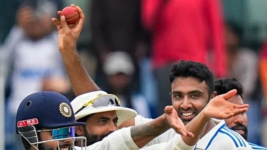 India's Ravichandran Ashwin shows the ball after taking 5-wicket haul on the fourth day of the first Test cricket match between India and Bangladesh, at MA Chidambaram Stadium in Chennai, Sunday