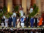 From left, Prime Minister of Nepal, Pushpa Kamal Dahal, Prime Minister of Bangladesh, Sheikh Hasina, President of Maldives, Dr Mohamed Muizzu, Indian Vice President Jagdeep Dhankhar, Indian President Droupadi Murmu, Prime Minister Narendra Modi, President of Sri Lanka, Ranil Wickremesinghe, Vice-President of Seychelles, Ahmed Afif, Prime Minister of Mauritius, Pravind Kumar Jugnauth and Prime Minister of Bhutan, Tshering Tobgay pose for a group photograph after the swearing-in ceremony of Modi, at Rashtrapati Bhavan in New Delhi on Sunday.(AP)