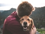 Dogs are our furry best friends. Our pets, without exchanging a word with us, occupy the largest parts of our hearts. Spending time with them makes us feel happier and drives our blues far away. Dogs can help in combating anxiety as well – mentioned Psychologist Carolyn Rubenstein. Here's how spending time with your dog can help you beat anxiety.(Unsplash)