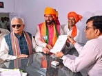 Kurukshetra: Haryana Chief Minister Nayab Saini who files his nomination papers for Haryana Assembly elections, as Union Minister Manohar Lal looks on, in Kurukshetra, Tuesday, Sept. 10, 2024. (PTI)