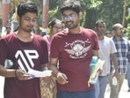 Candidates are seen discussing after appearing for the UPSC Civil Services Main Examination 2024 at College of Commerce in Patna.(Santosh Kumar)