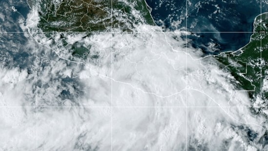 This National Oceanic and Atmospheric Administration satellite image shows Hurricane John near southern Mexico. Mexico travel alert: Deadly Hurricane John strikes southern Pacific coast with 'life-threatening' flood potential (NOAA via AP)