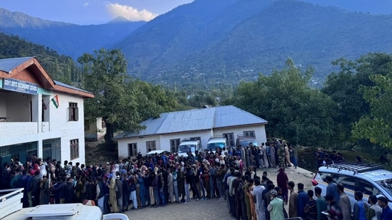 Jammu and Kashmir assembly election 2024 live updates: People queued up at a polling station in Ganderbal assembly constituency. (ECI)